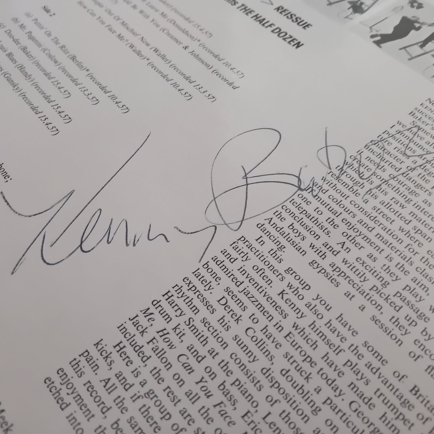 Document with a signature on a printed text background