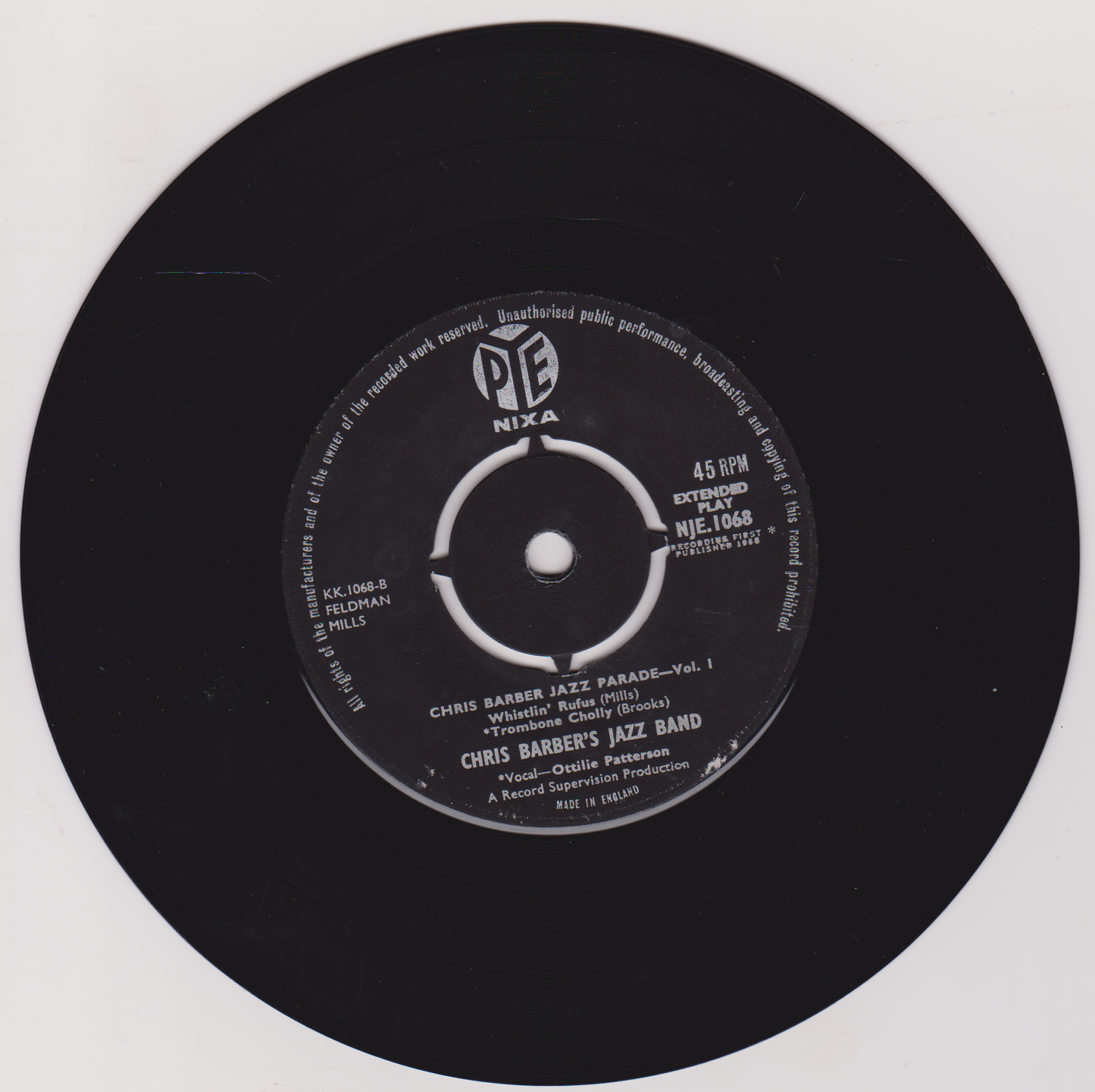 Black vinyl record with label on white background