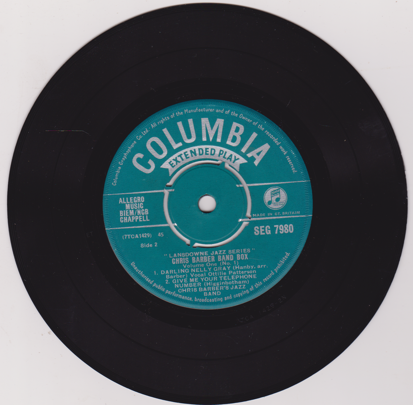 Vinyl record with blue label on white background