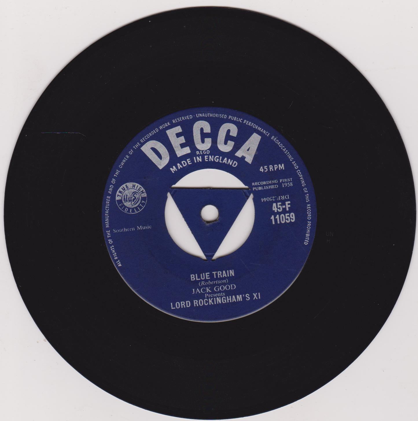 Decca label on a black vinyl record with blue label