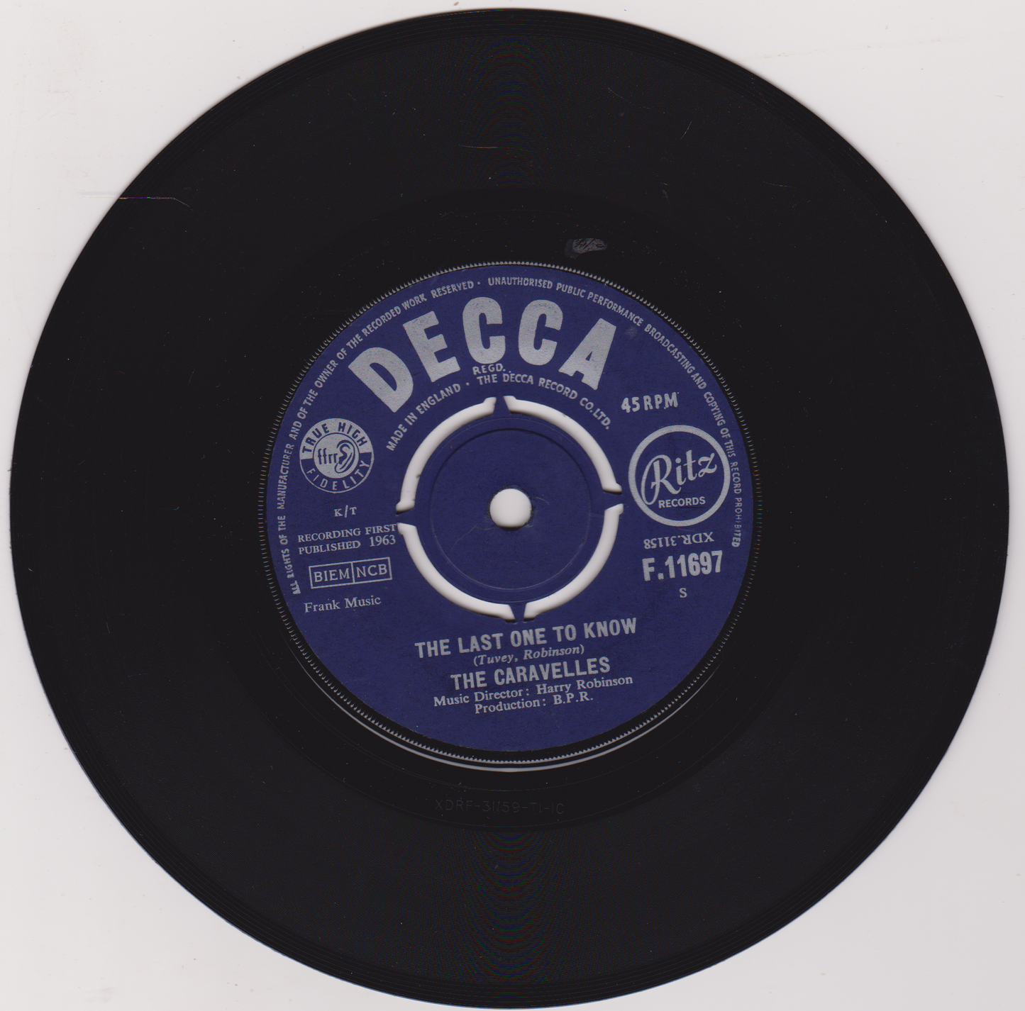 Black vinyl record with a blue label featuring 'Decca' and 'Ritz' logos on a white background.