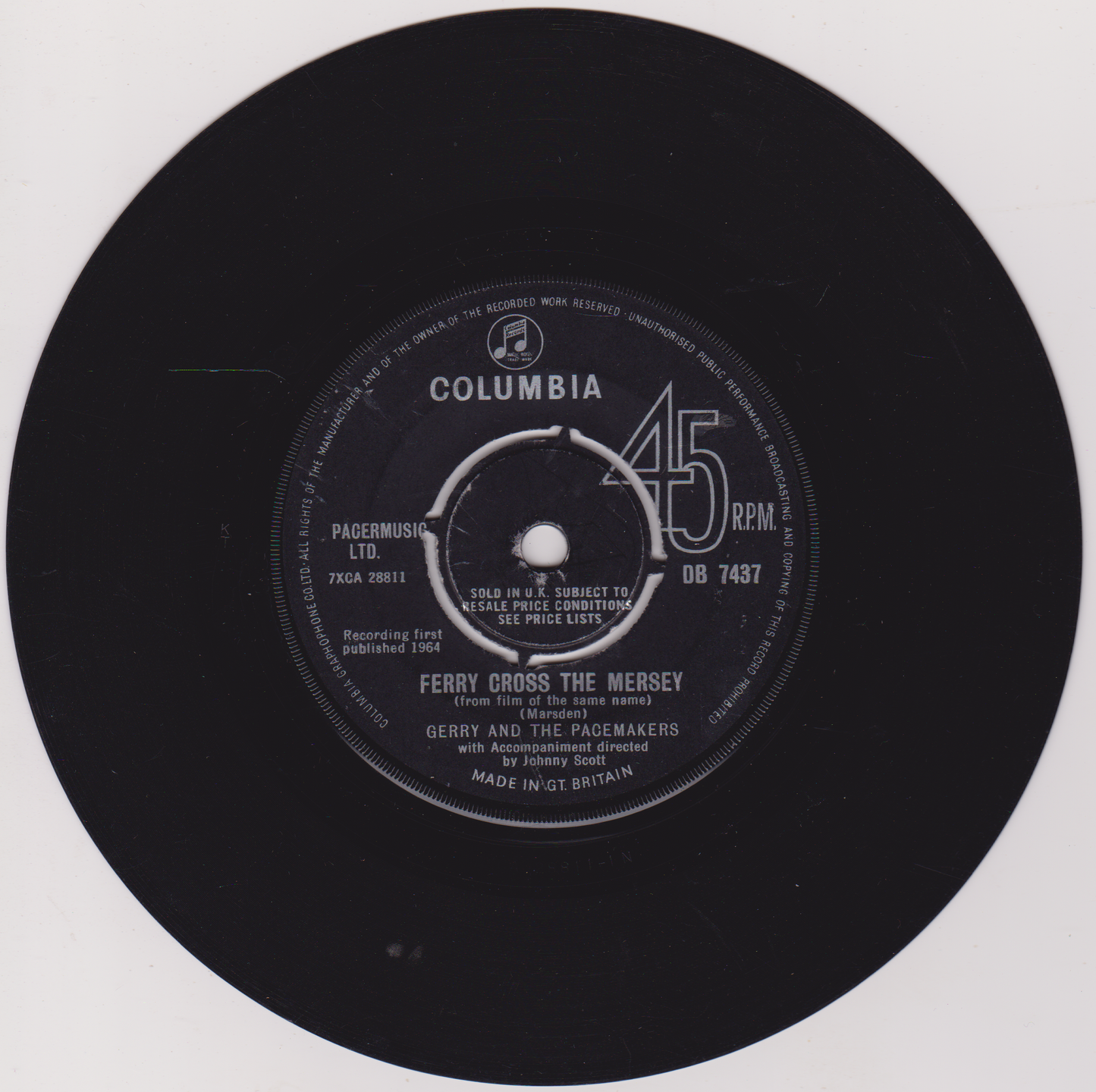 Record label of a vinyl record with 'Columbia' branding and song information.