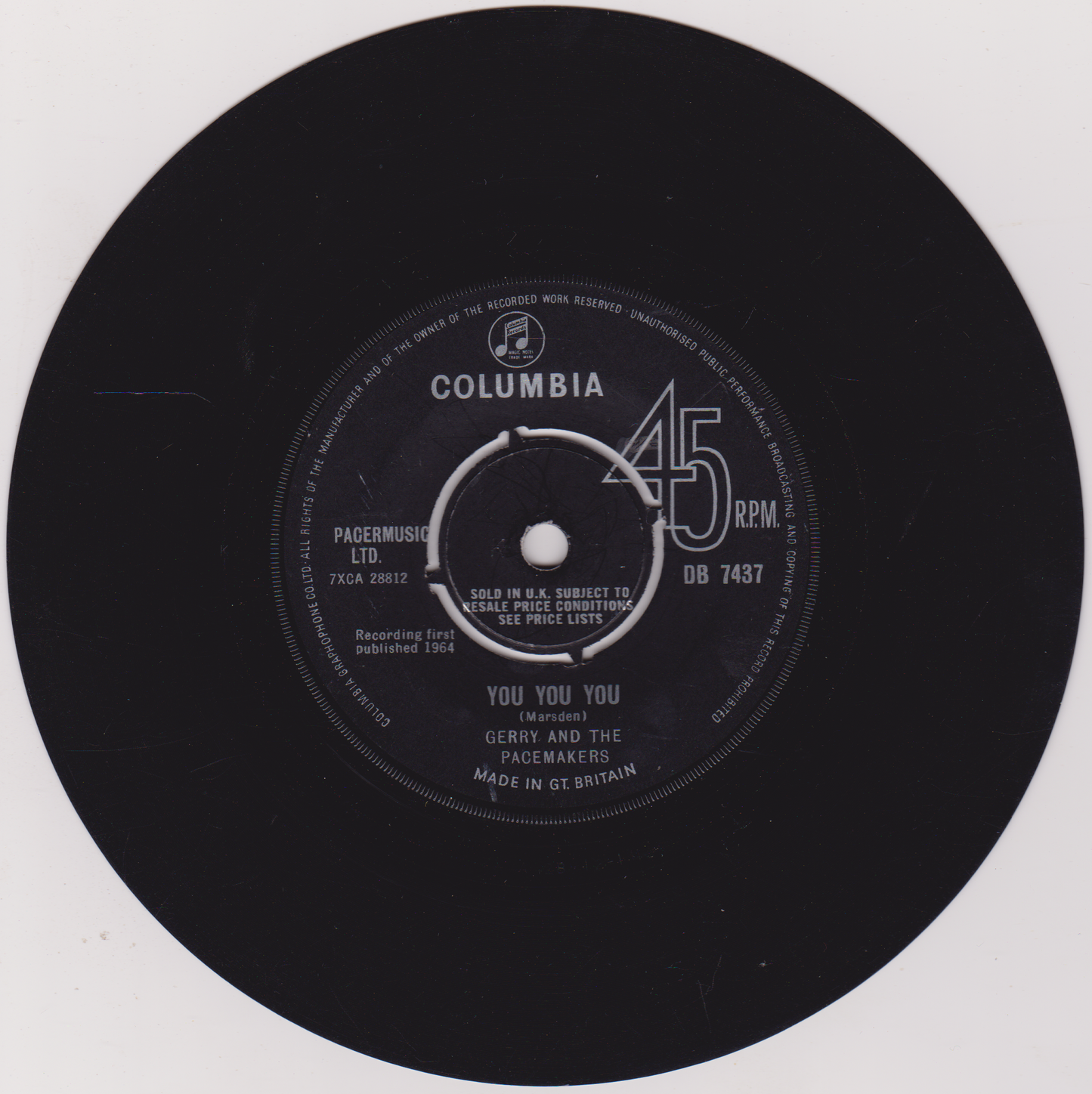 Black vinyl record with Columbia label on a white background