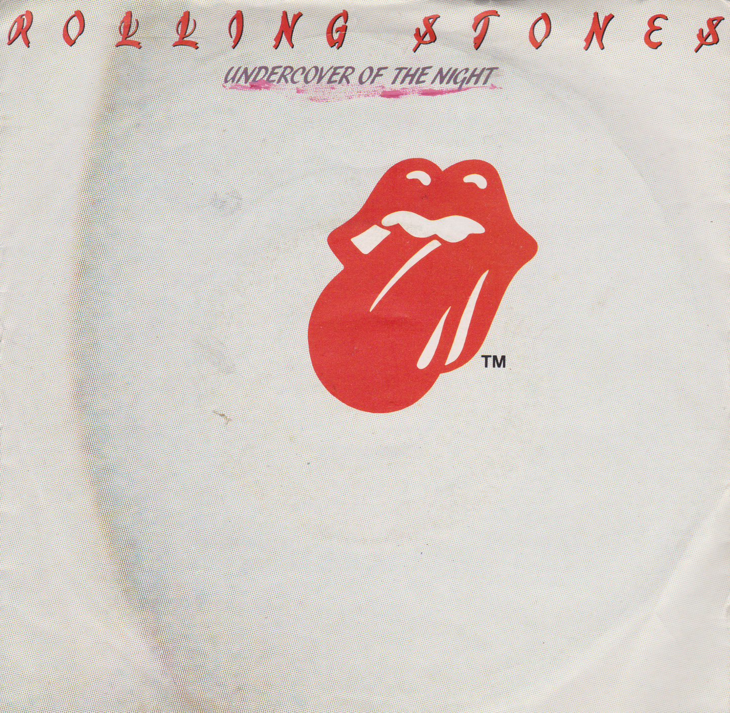 Single cover with Rolling Stones logo and text 'Undercover of the Night' on a light background