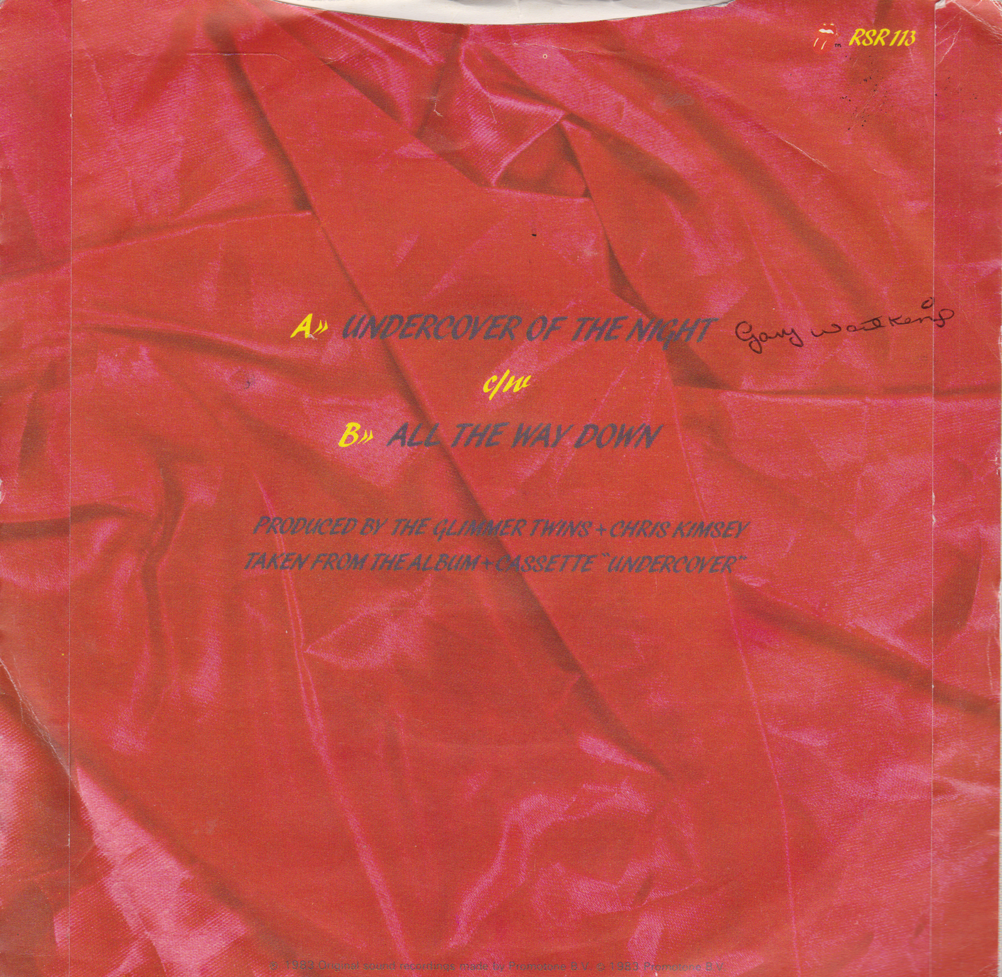 Vinyl record cover with red abstract design and text