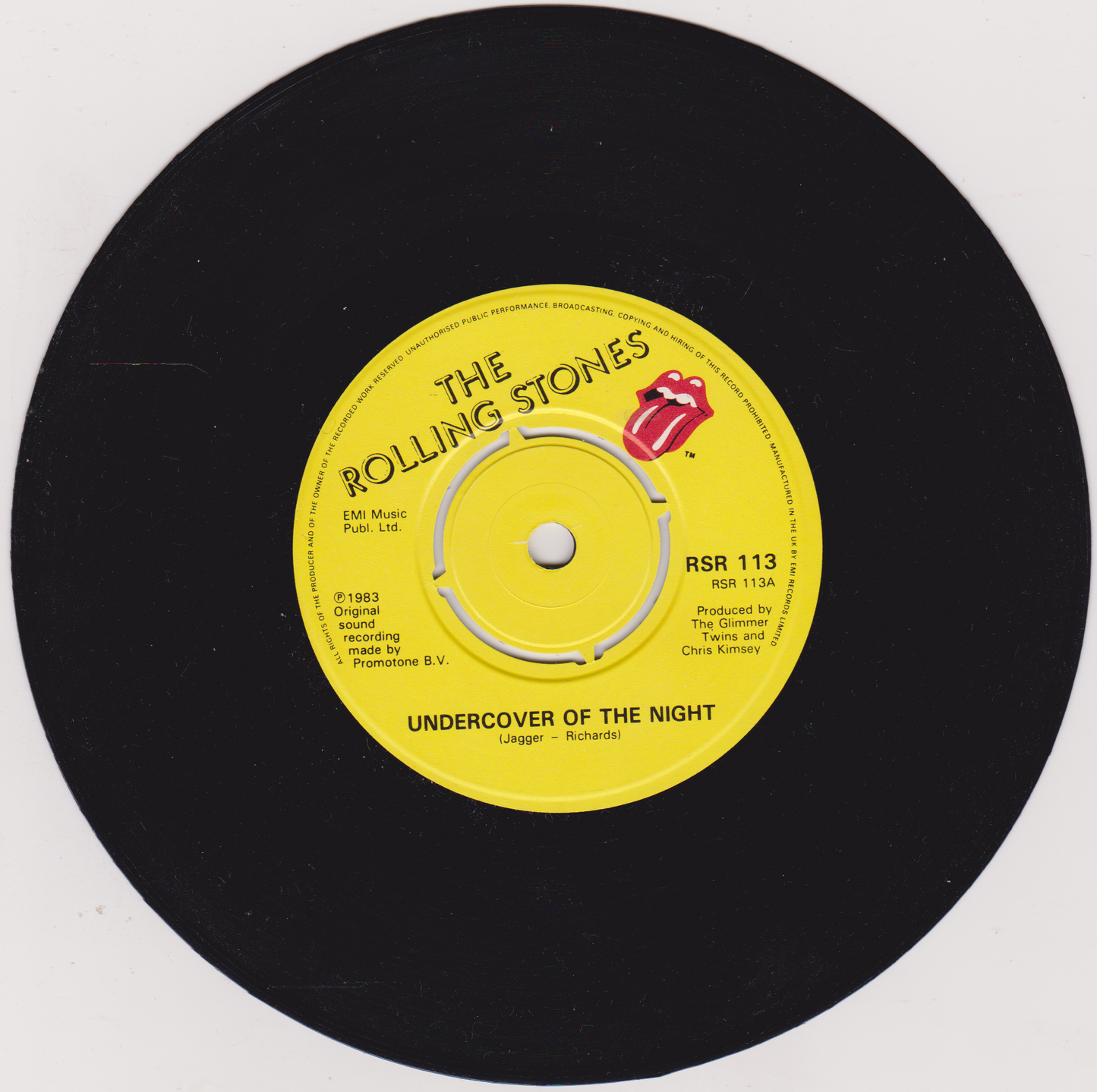Vinyl record label with The Rolling Stones logo and text on a black background