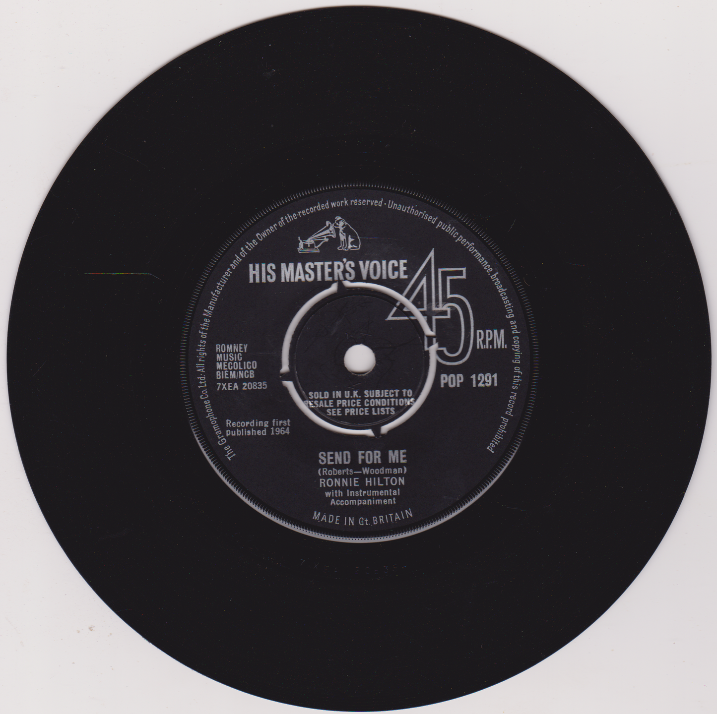 Black vinyl record with 'His Master's Voice' label on a white background
