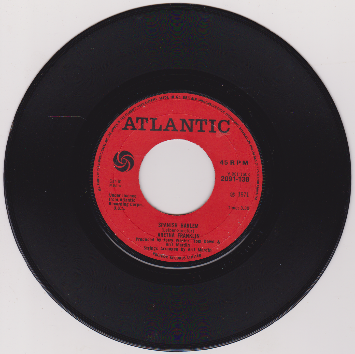Black vinyl record with a red label featuring the Atlantic Records logo on a white background