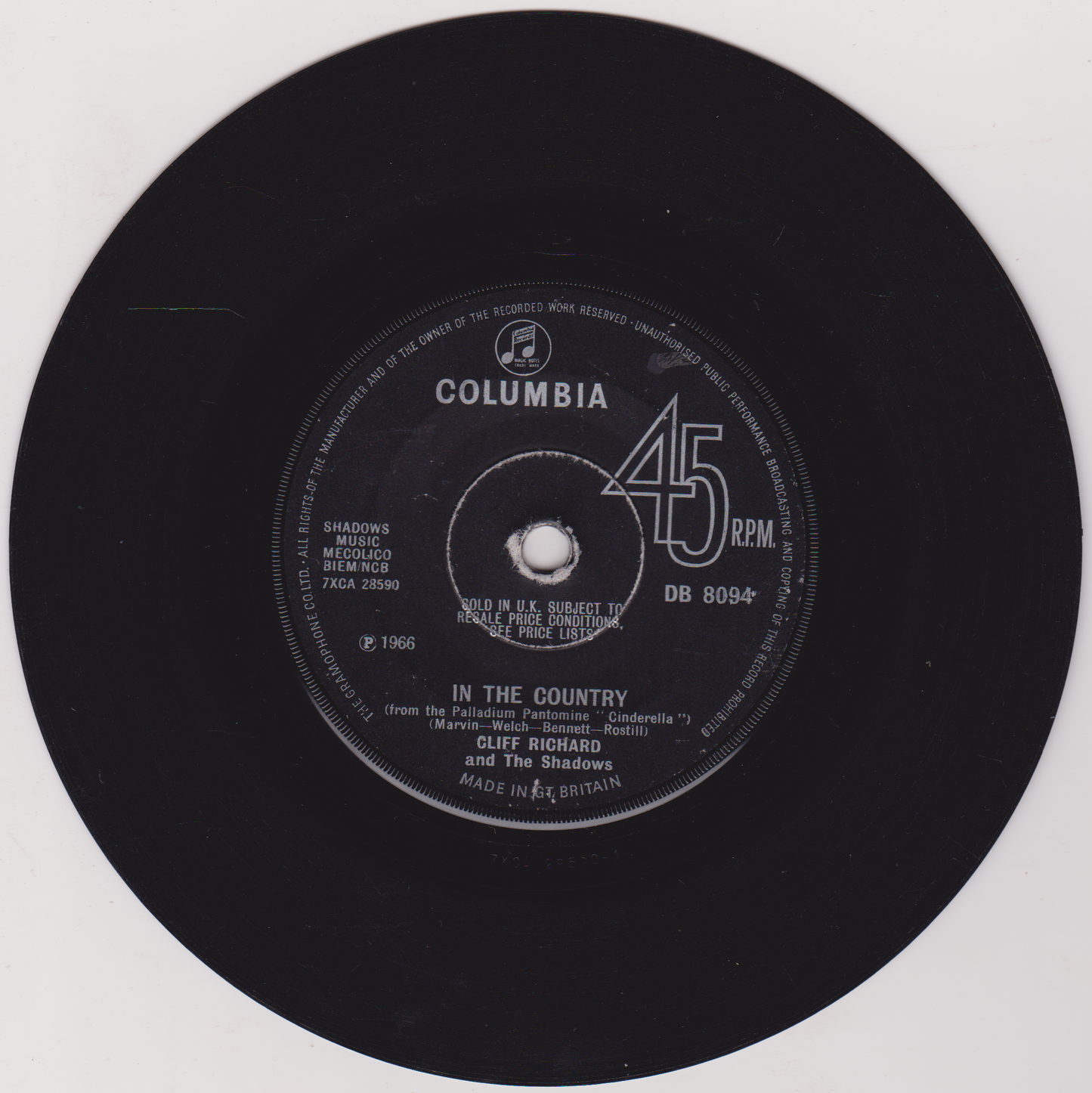 Black vinyl record with Columbia label and text on a white background