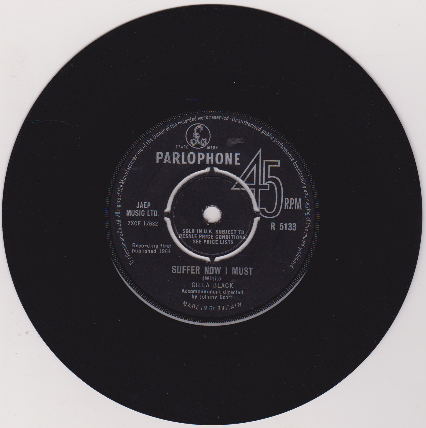 Black vinyl record with Parlophone label on a white background