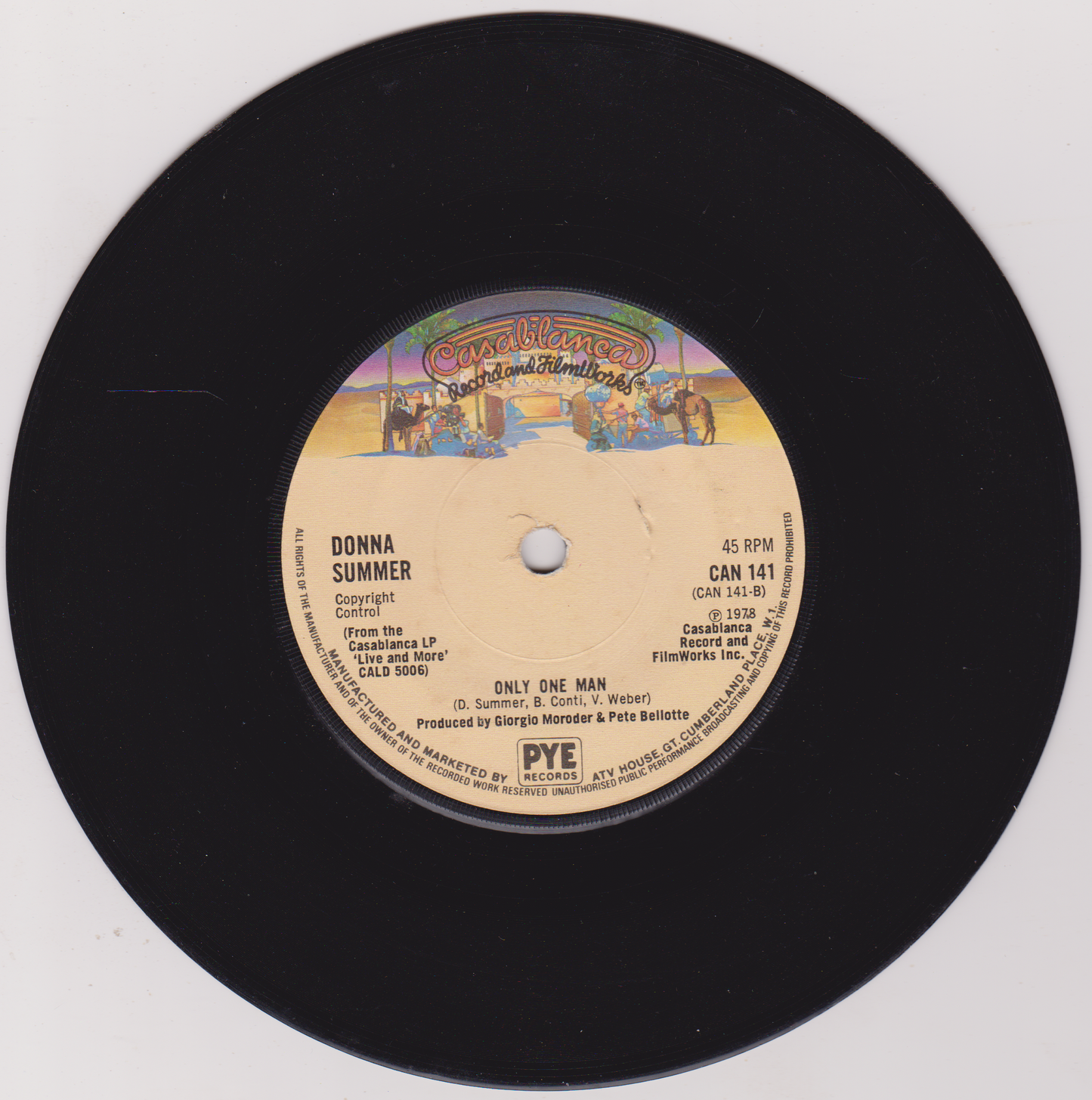 Vinyl record with a colorful label featuring text and graphics on a white background