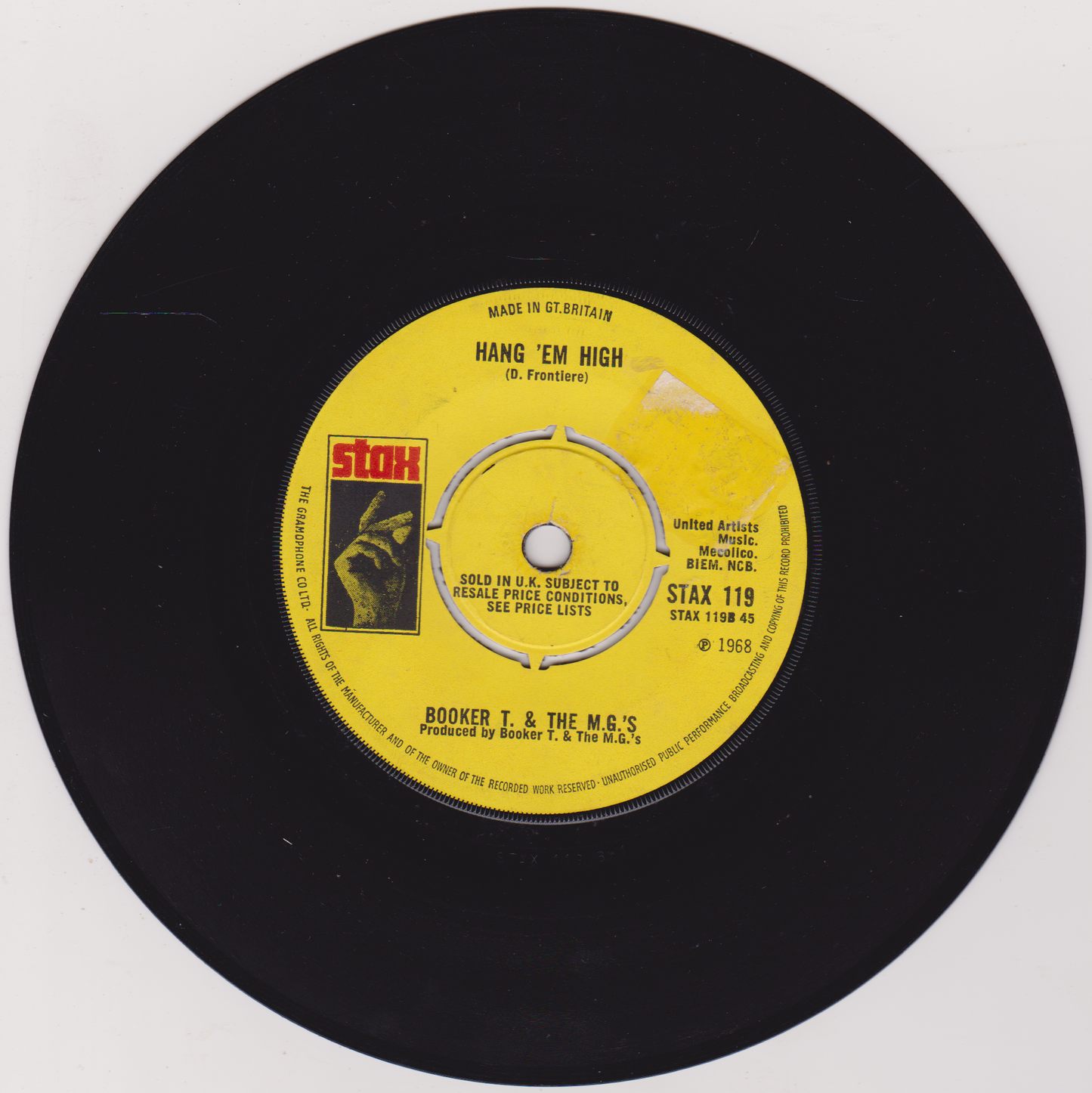 Vinyl record with yellow label featuring Stax Records logo on a white background