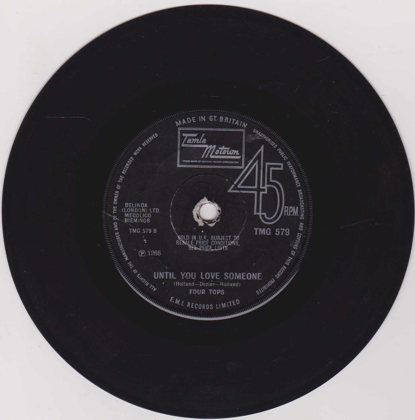 45 RPM record label with text and branding on a white background