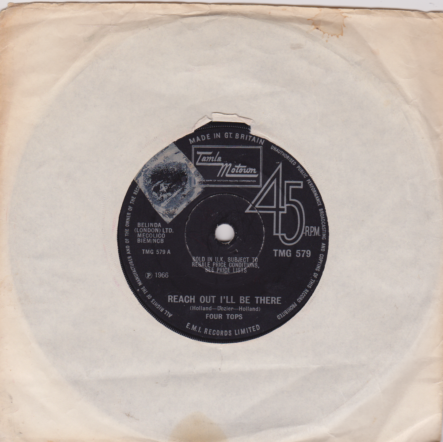 Record label with text and a 45 RPM symbol on a beige background
