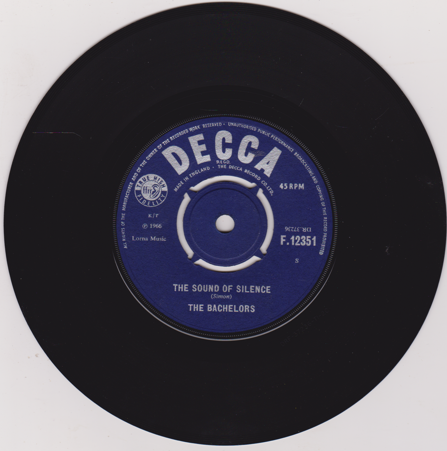 Black vinyl record with blue label featuring 'Decca' branding and song details.