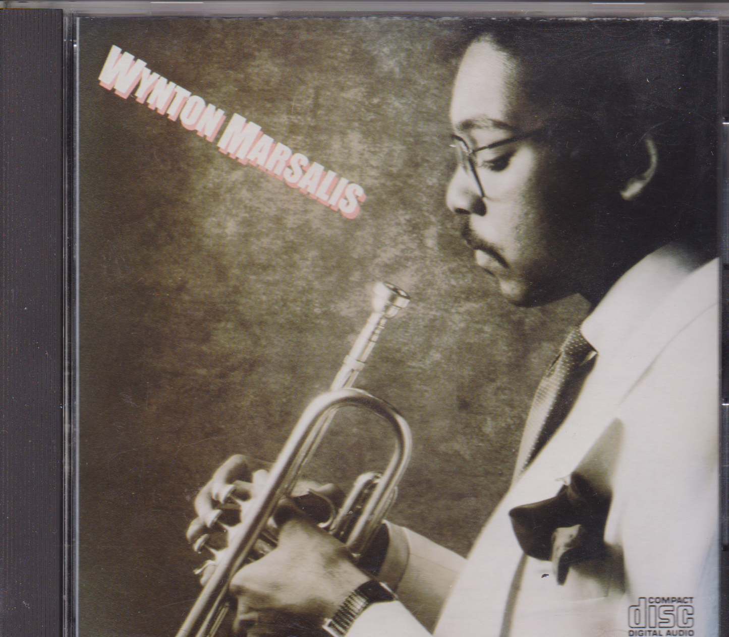 Album cover featuring a person playing a trumpet with 'Wynton Marsalis' text.
