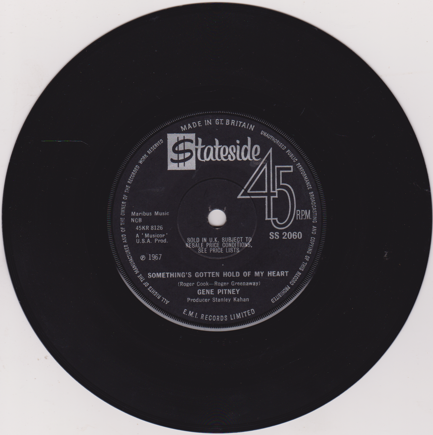 Black vinyl record label with 'Stateside' branding and text