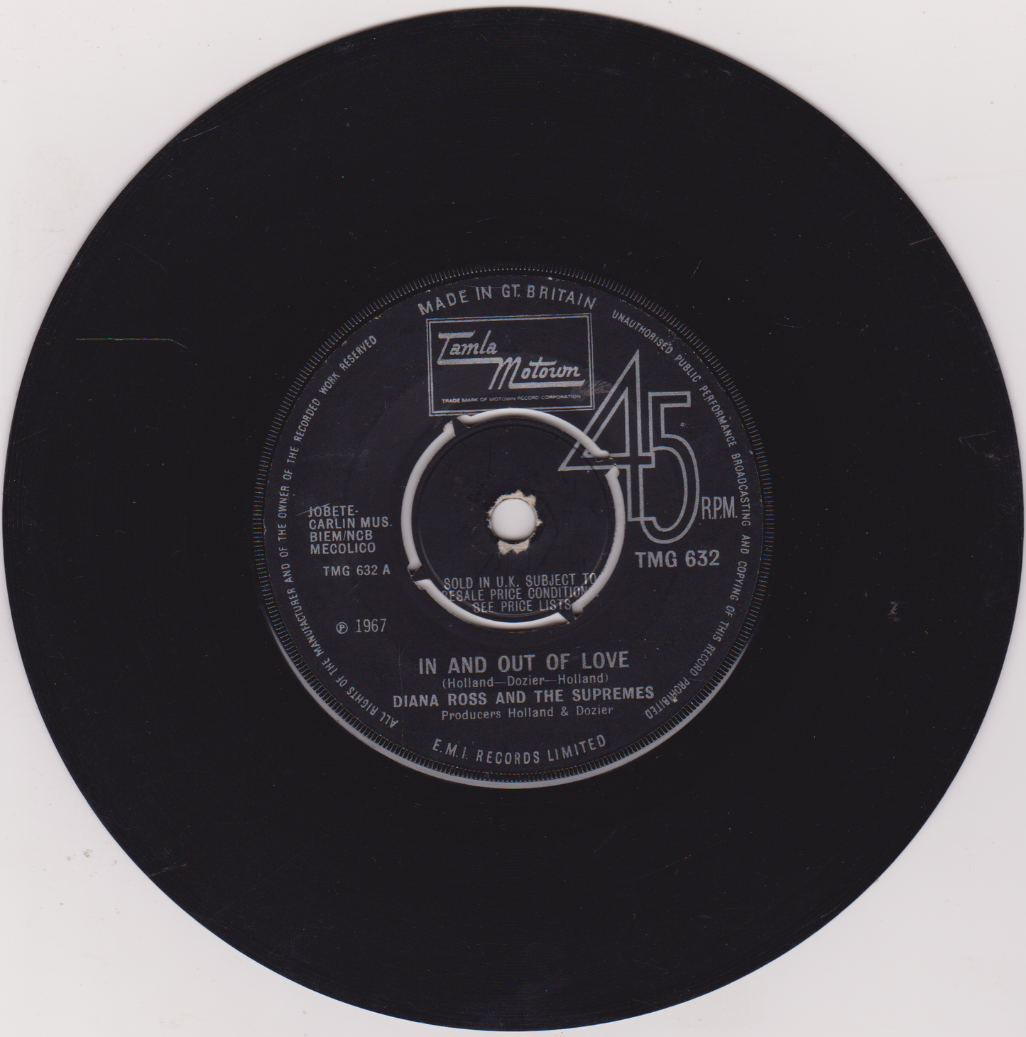 Record label with text and branding on a black background