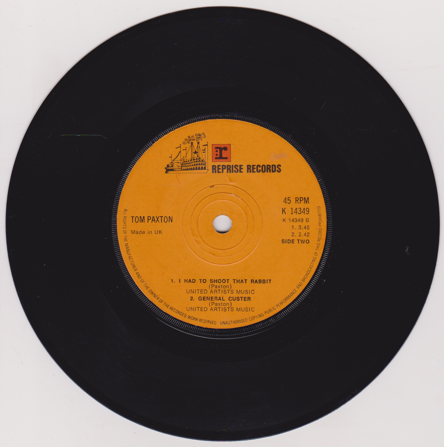 Record label of a vinyl record with 'Reprise Records' branding on a white background