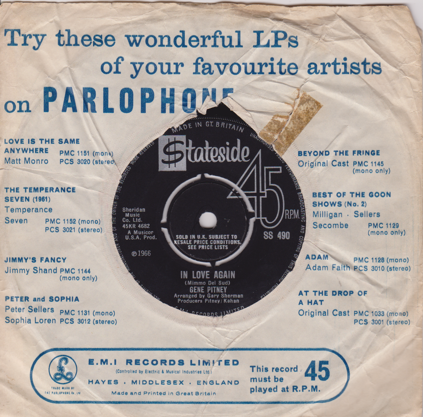 Vintage Parlophone record label with text and a small record illustration.