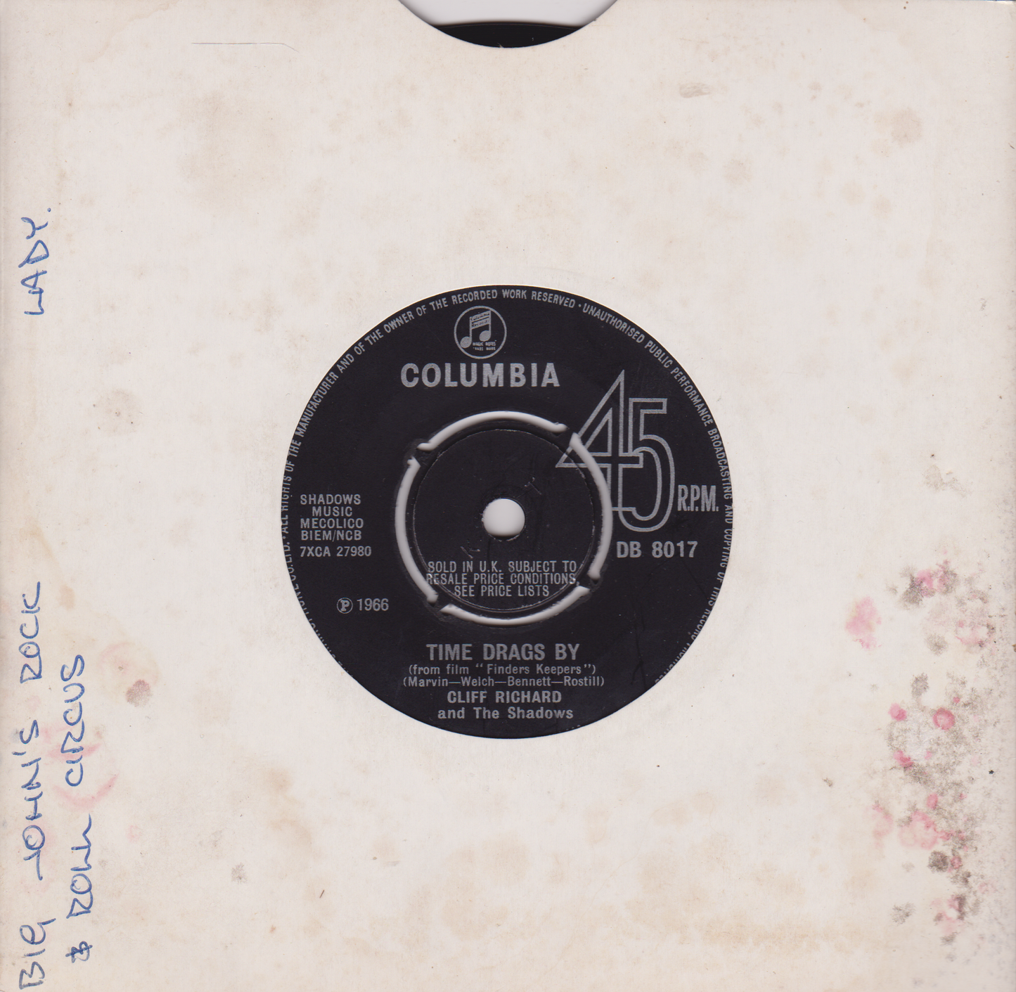 Vinyl record label with Columbia logo on a textured beige background