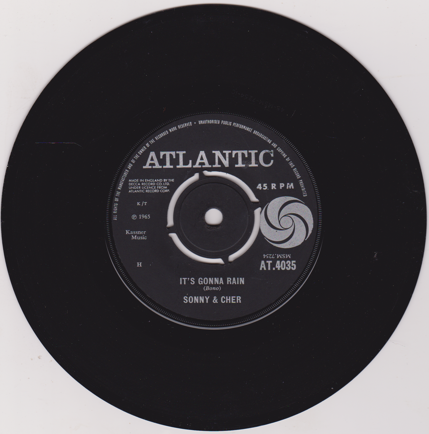 Black vinyl record with Atlantic label and Sonny & Cher song 'It's Gonna Rain'.