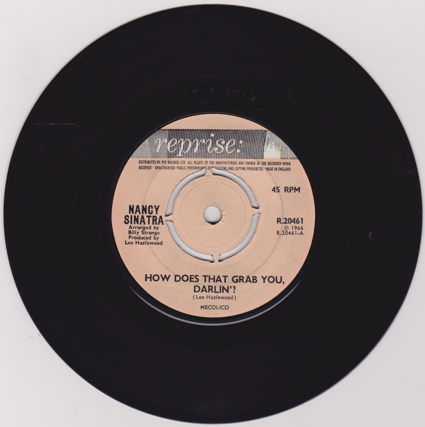 Vinyl record with Nancy Sinatra's 'How Does That Grab You, Darlin?' on a white background