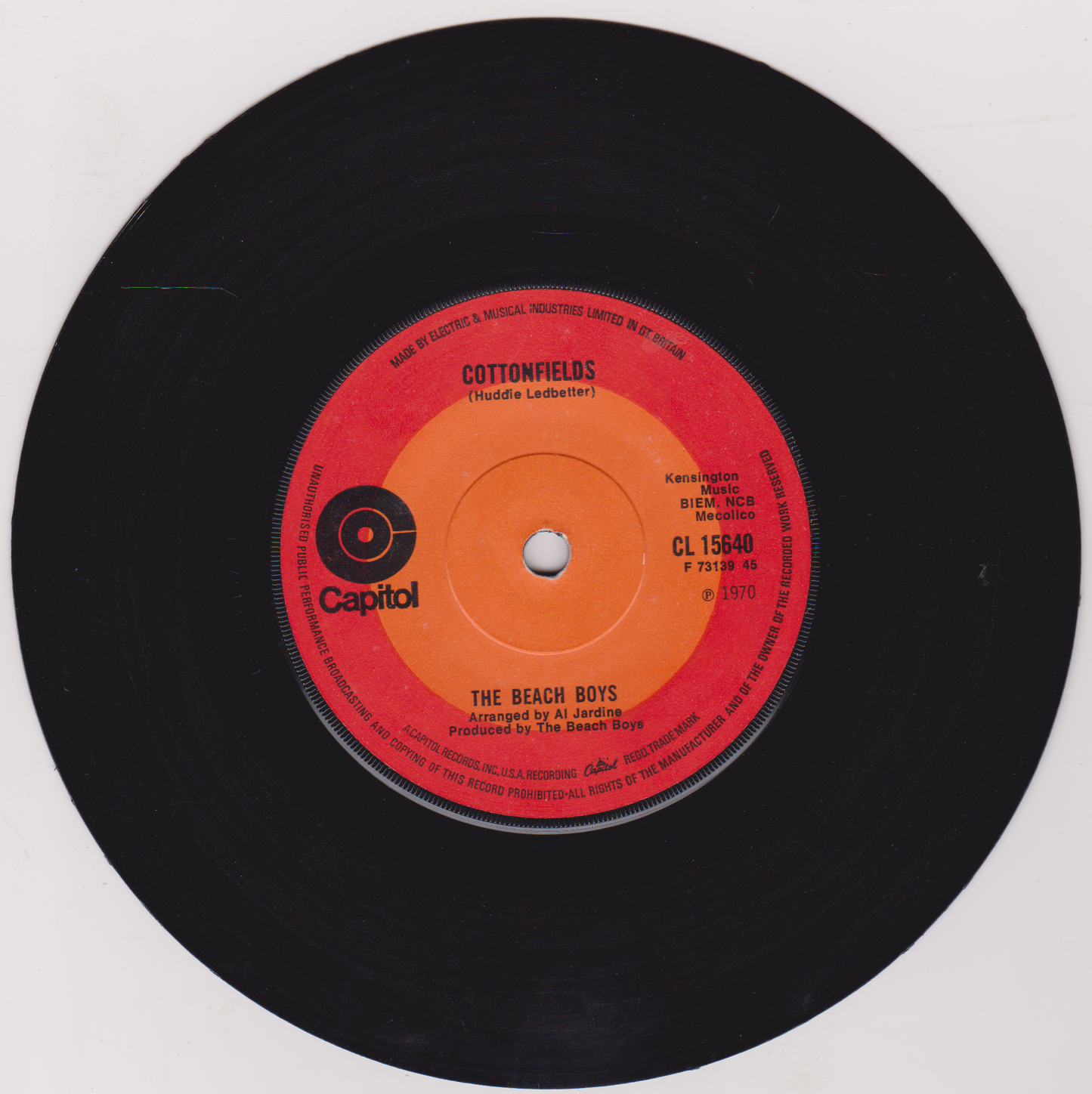Vinyl record with orange label featuring 'The Beach Boys' on a white background