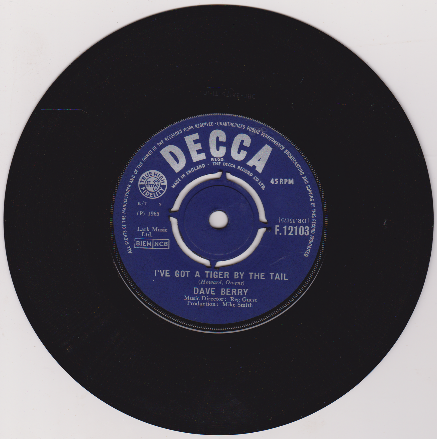 Black vinyl record with a blue Decca label on a white background