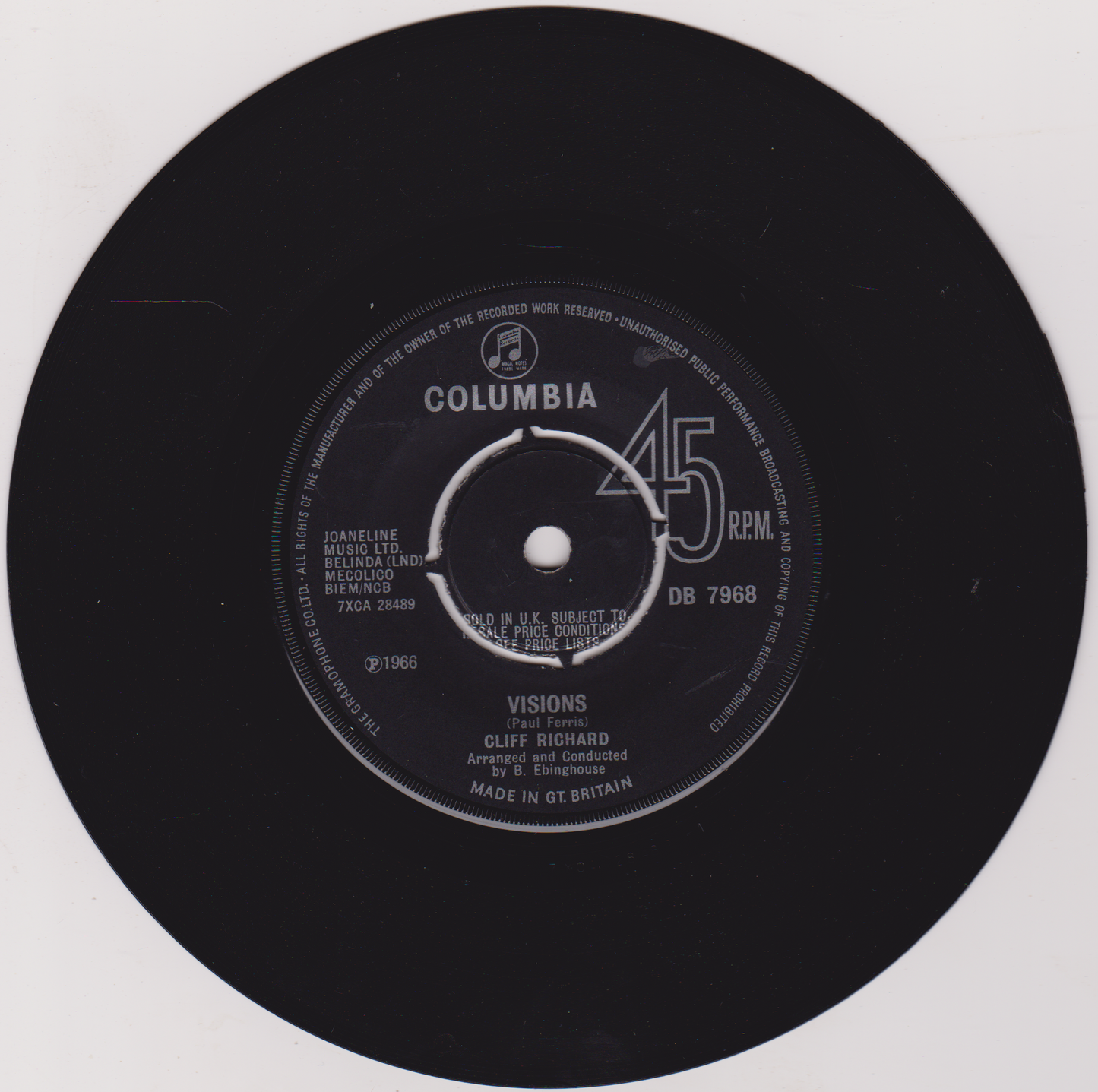 Black vinyl record with Columbia label and text on a white background