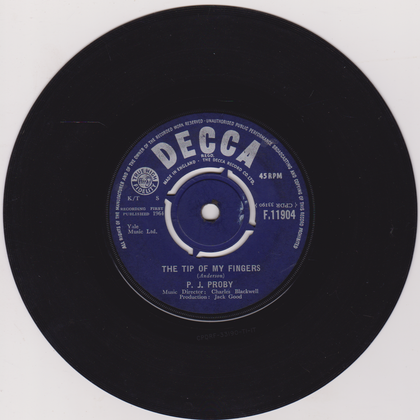 Black vinyl record with a blue label featuring 'Decca' branding on a white background