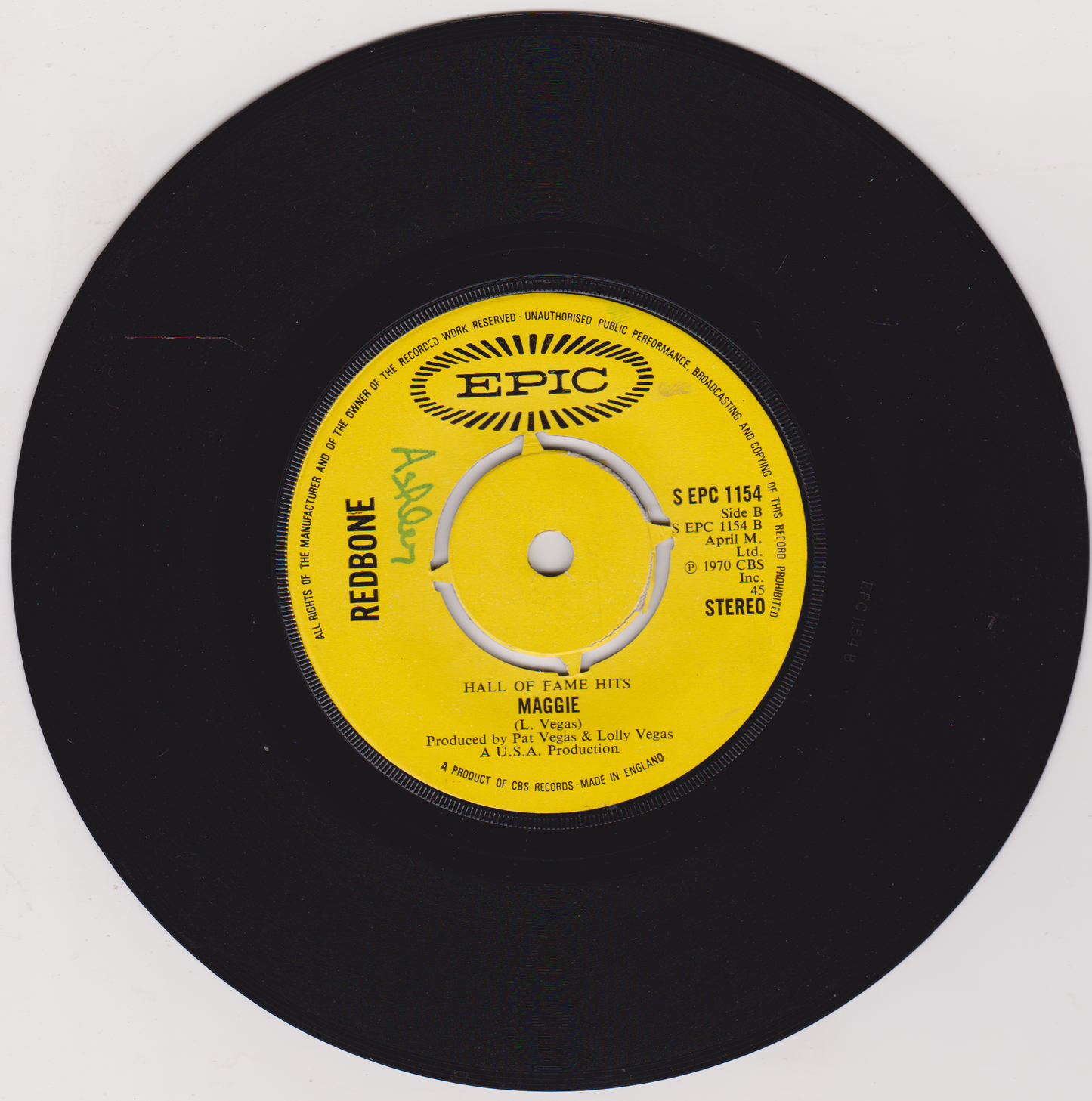 Vinyl record with yellow label featuring 'Epic' and 'Redbone' branding on a white background