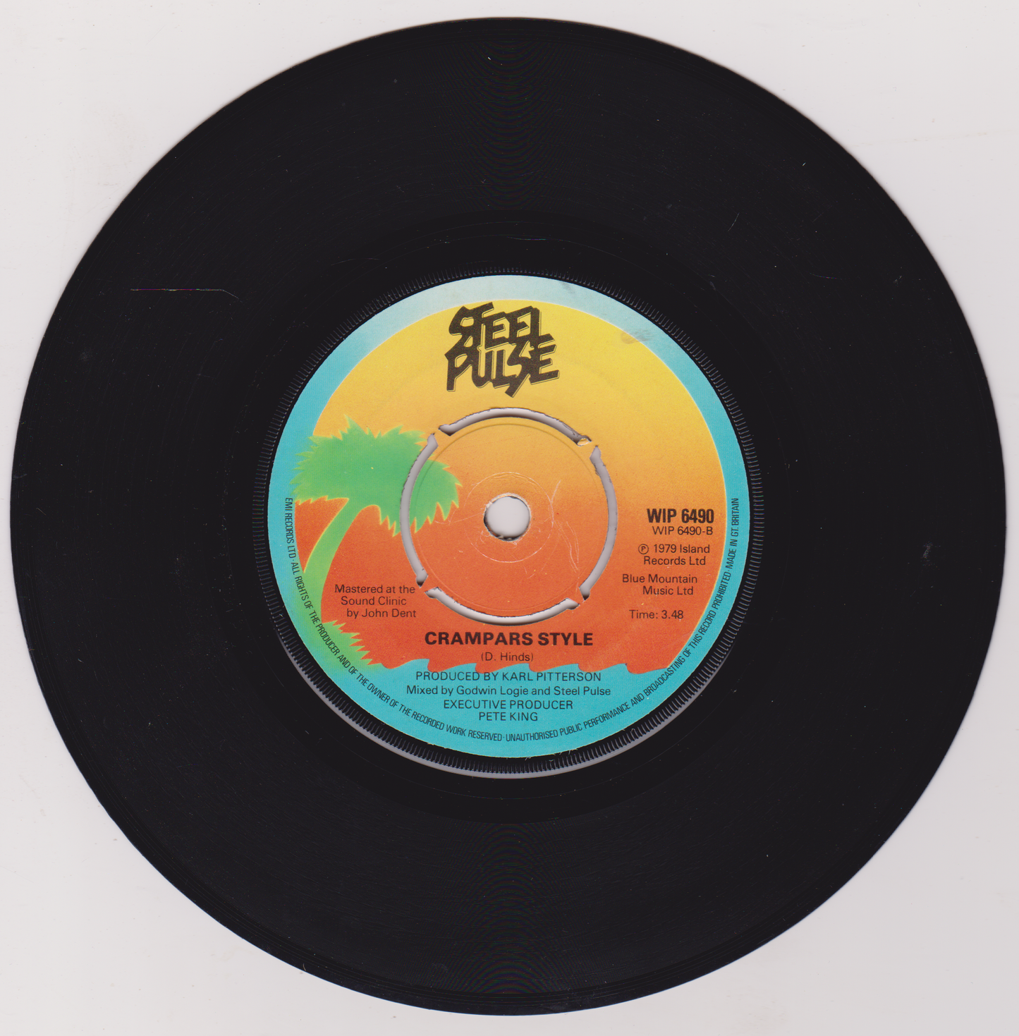 Vinyl record with a colorful label on a white background