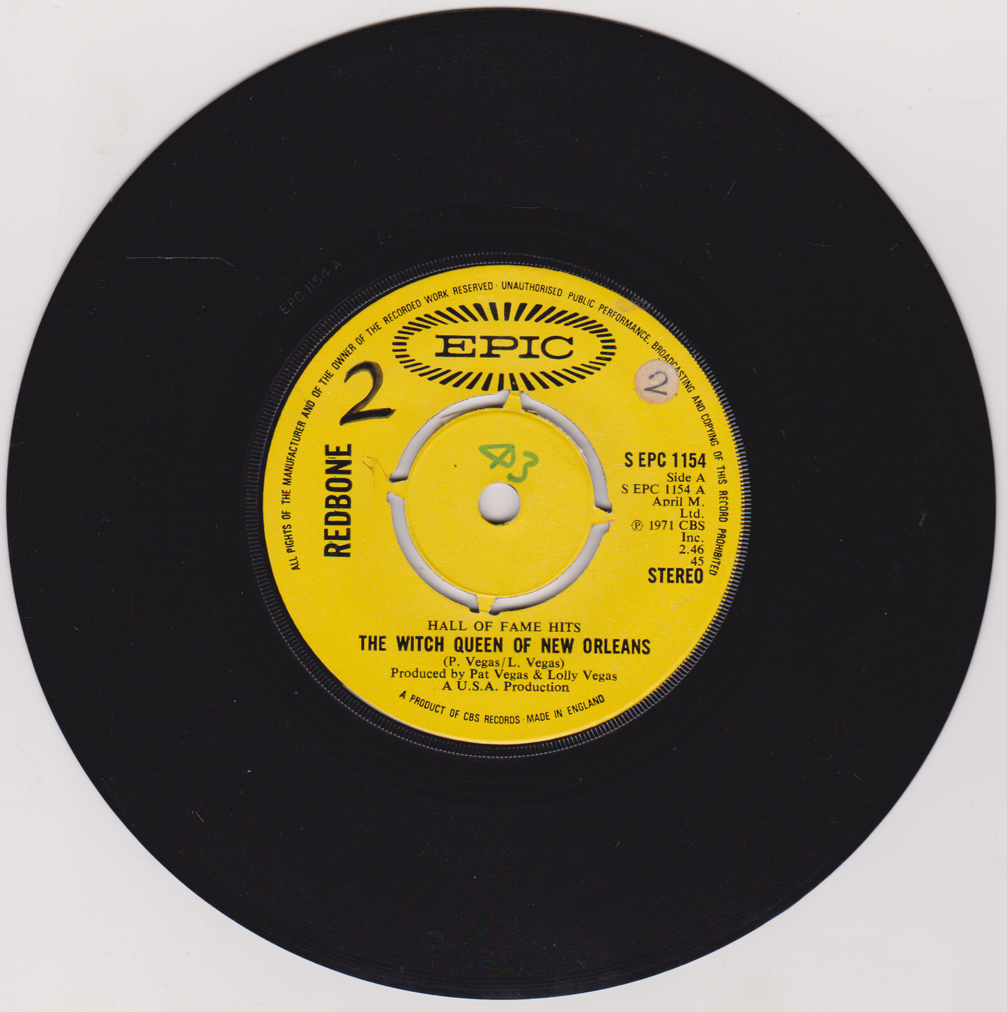 Black vinyl record with yellow label featuring 'Epic' records branding