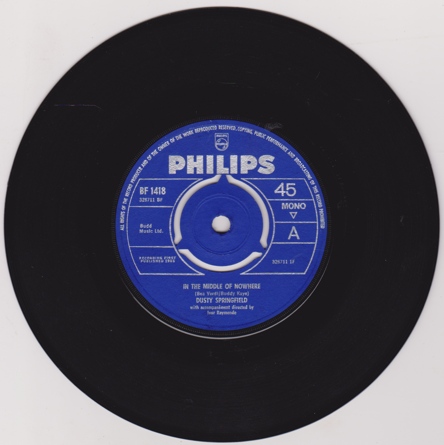 Black vinyl record with a blue Philips label on a white background