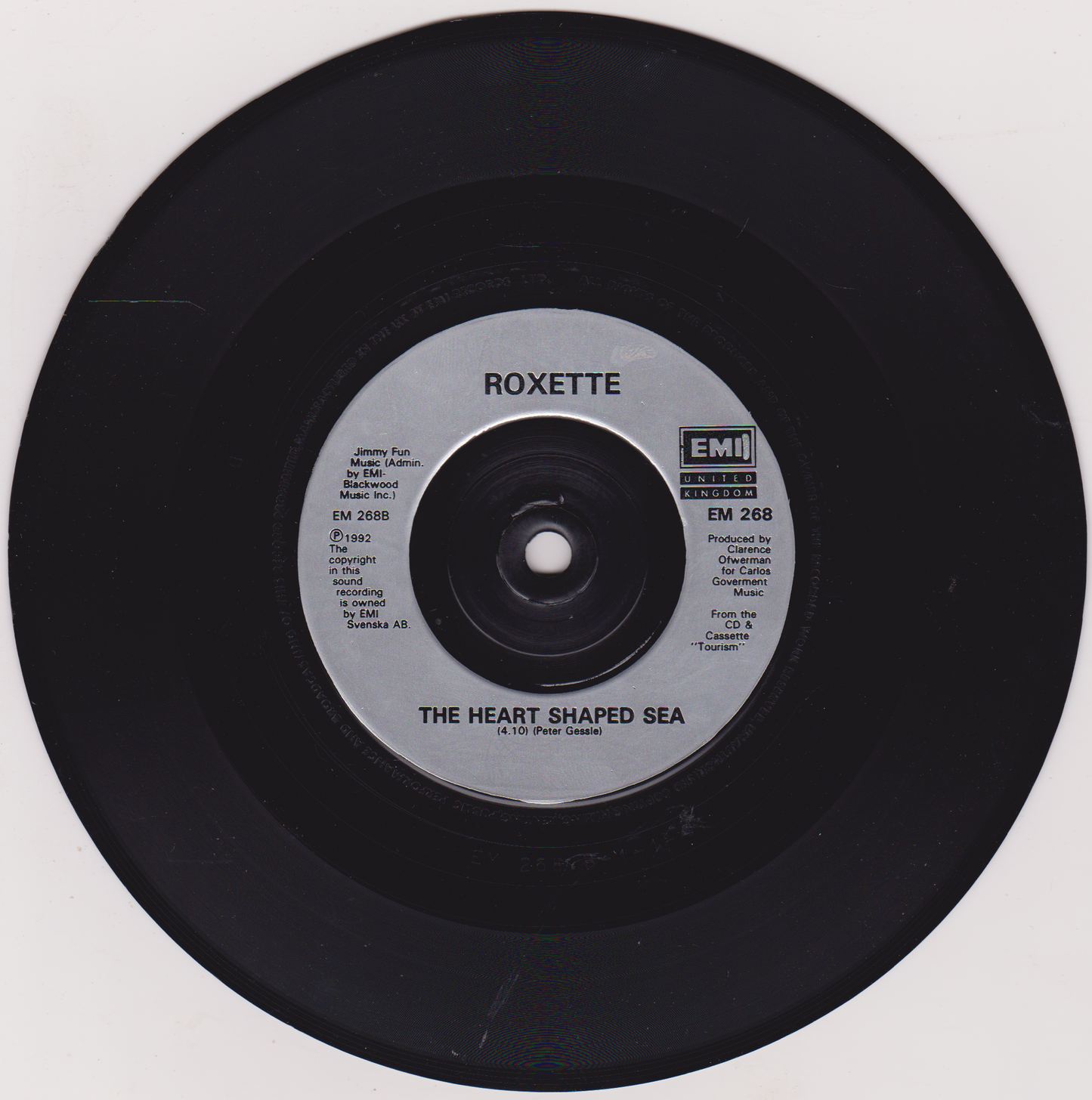 Black vinyl record with a silver label featuring the band Roxette and the song 'The Heart Shaped Sea'.