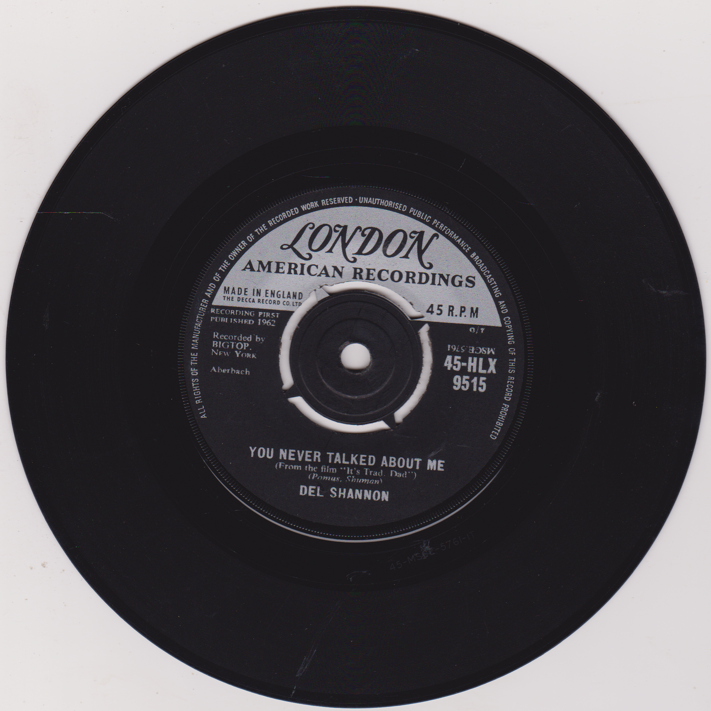Black vinyl record with 'London American Recordings' label on a white background