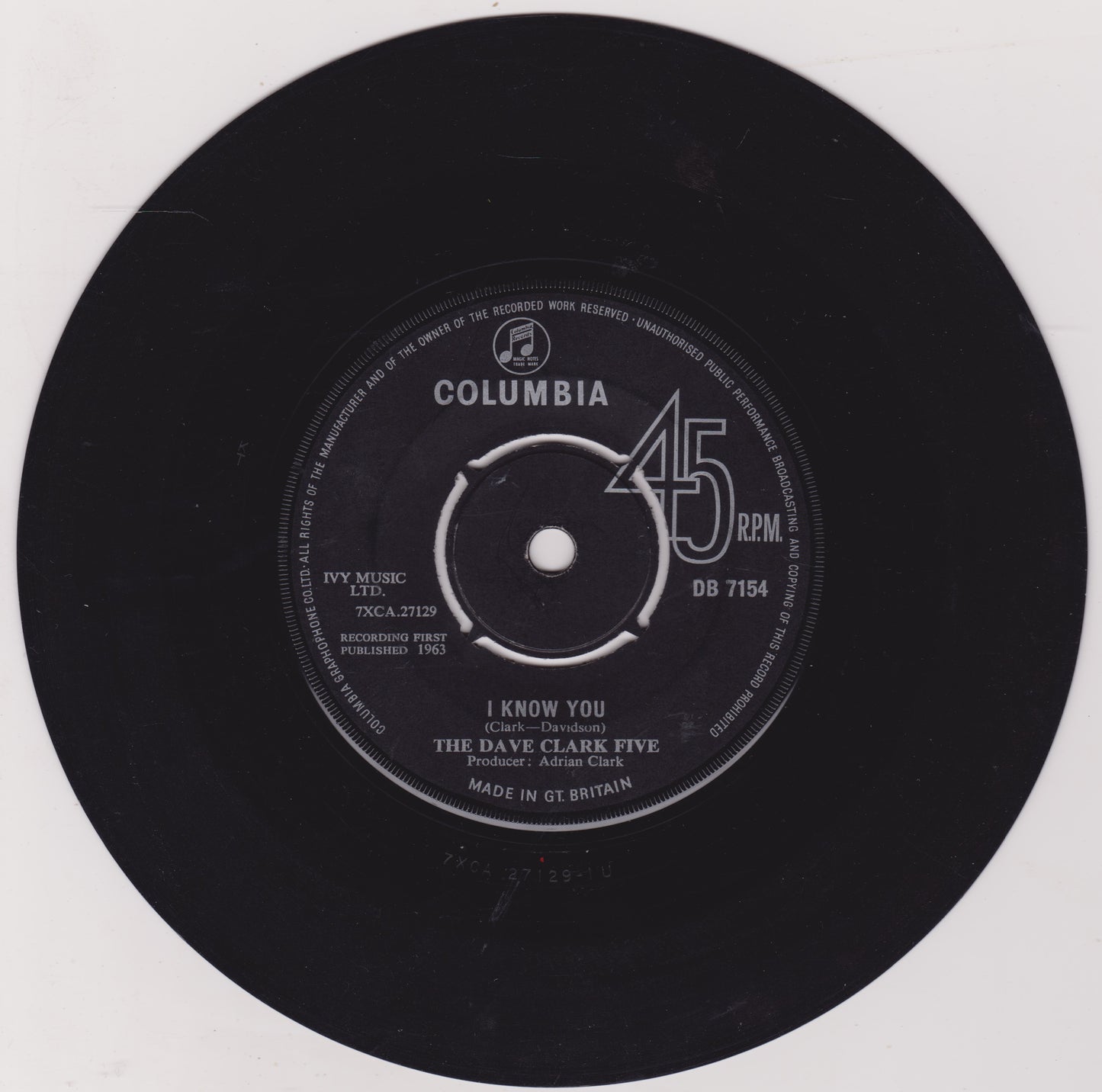 Black vinyl record with Columbia label and 'I Know You' by The Dave Clark Five on a white background