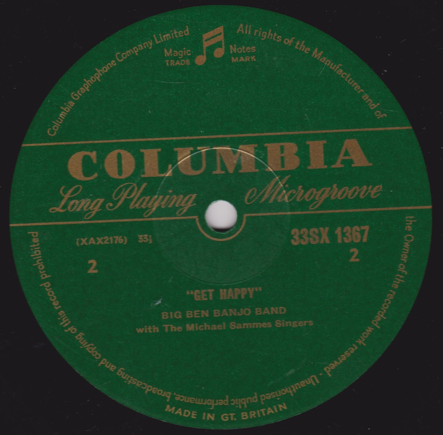 Columbia record label with text and music notes on a green background