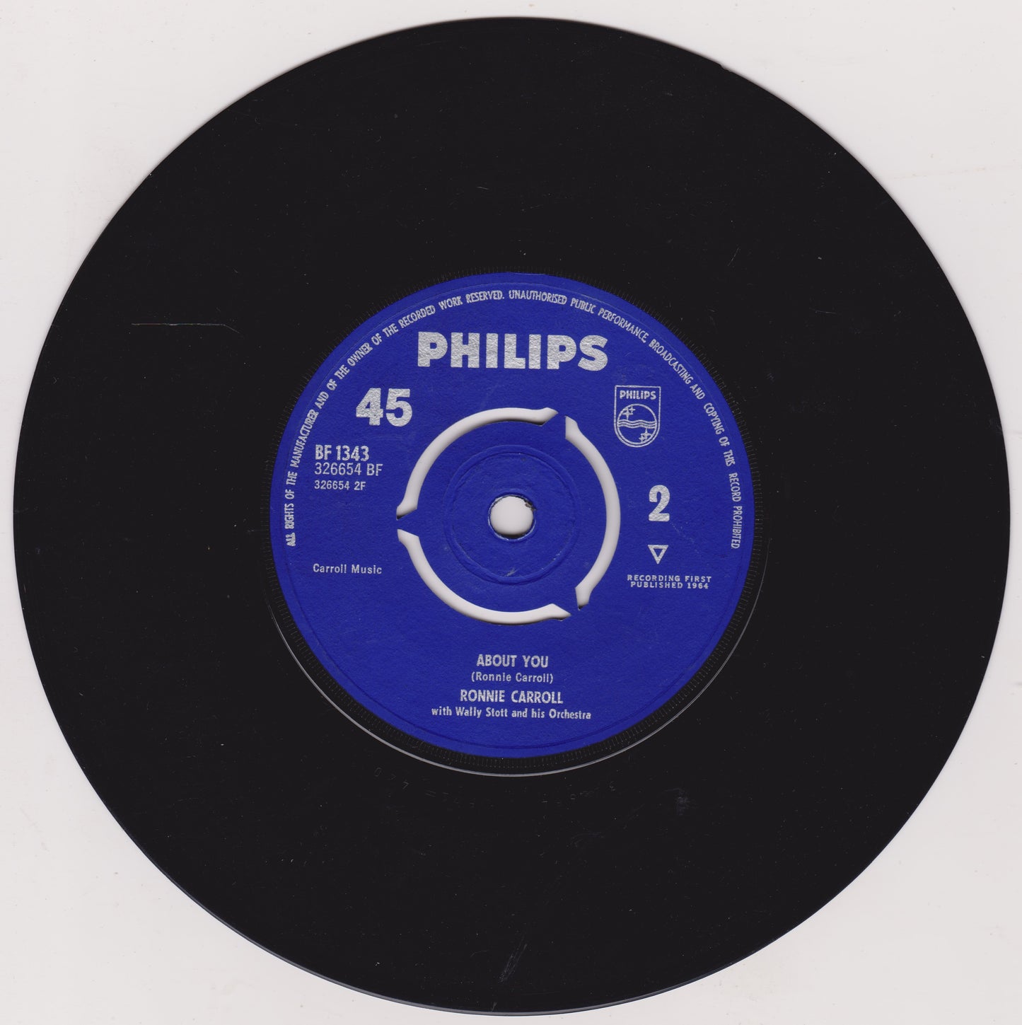 Black vinyl record with a blue Philips label on a white background