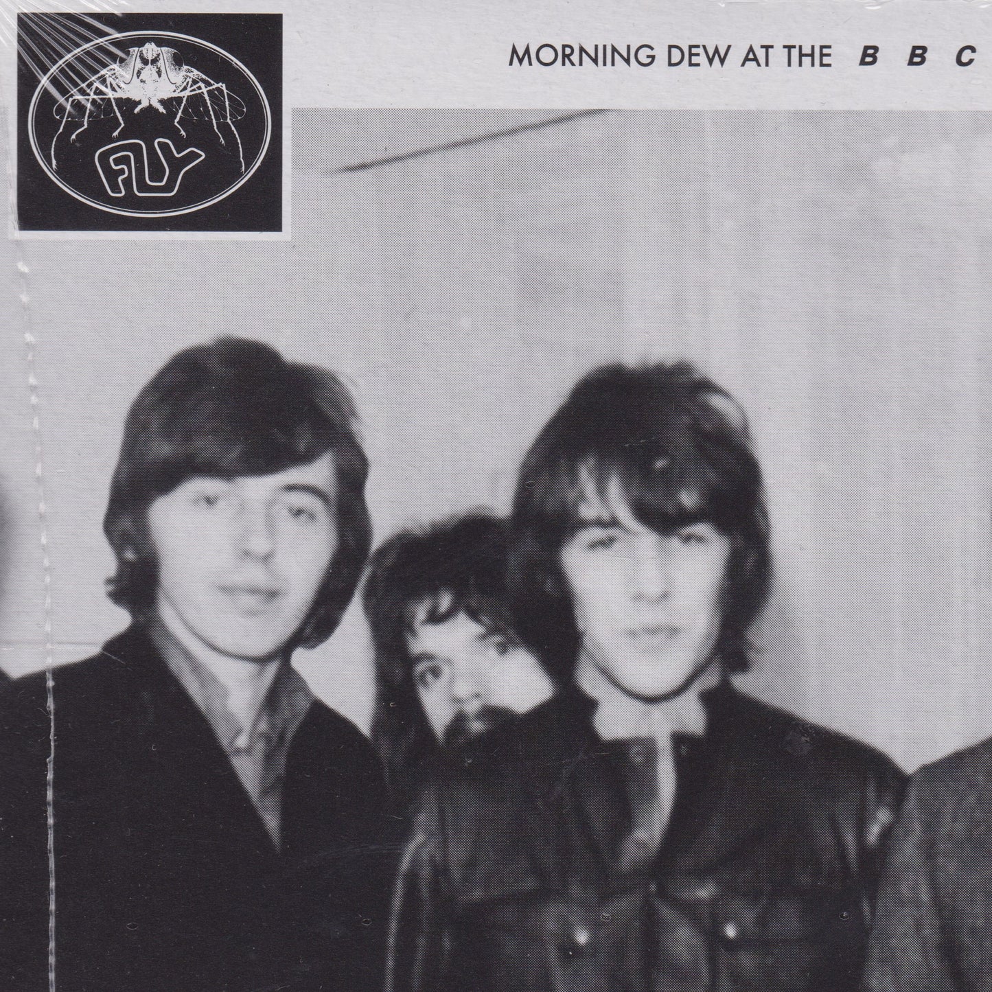 Black and white photo of three men with text 'Morning Dew at the BBC' and a logo.