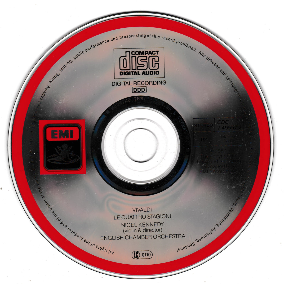 A compact disc with a red outer ring, black centre, and silver reflective surface. Visible text includes 'Compact Disc Digital Audio', 'EMI', and 'Vivaldi Le Quattro Stagioni Nigel Kennedy English Chamber Orchestra'.