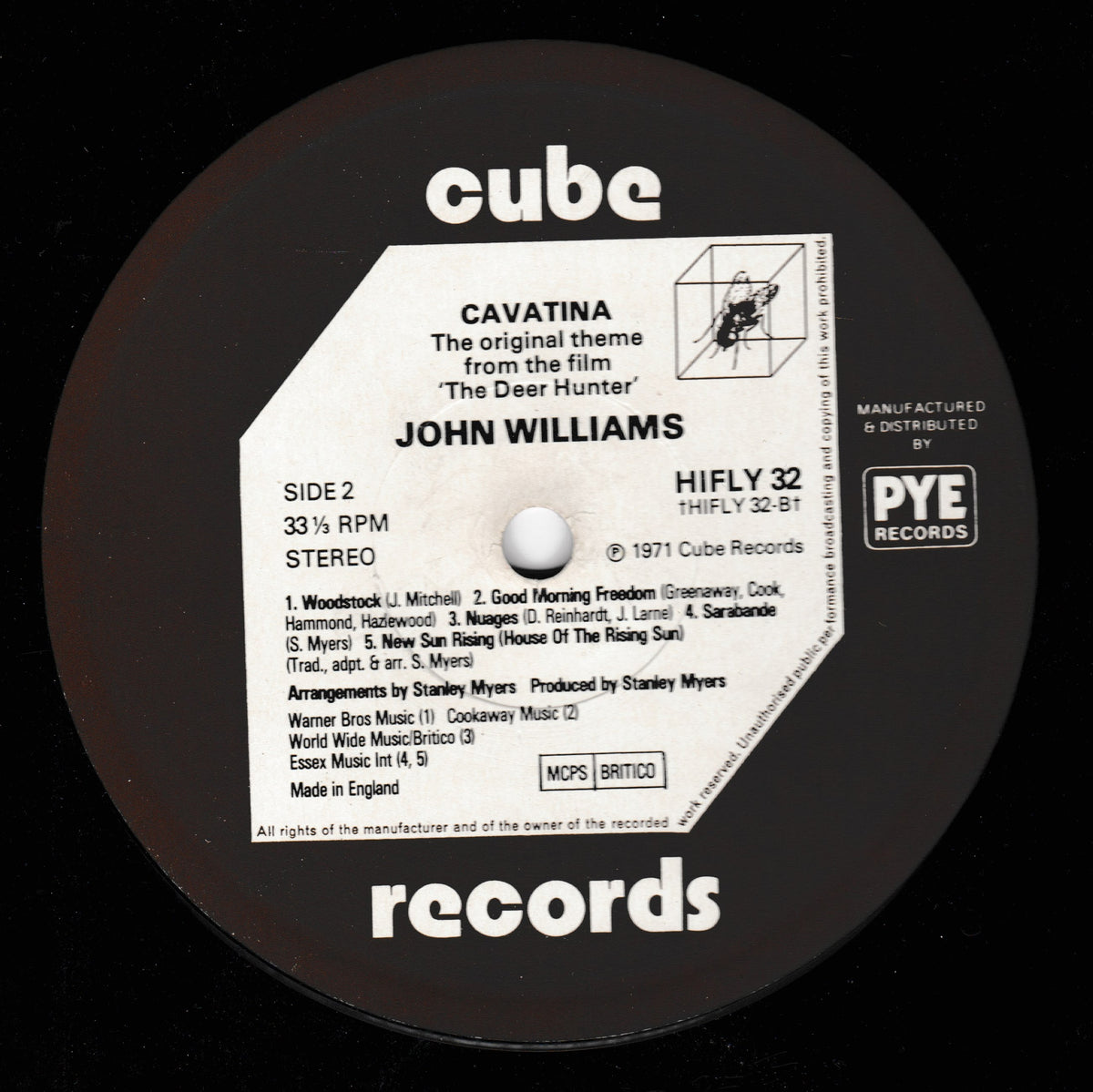 A close-up of a vinyl record label for Cube Records' release of John Williams' Cavatina, Side 2, 33 1/3 RPM Stereo. The black record features a white paper label with black text and a central white spindle hole.