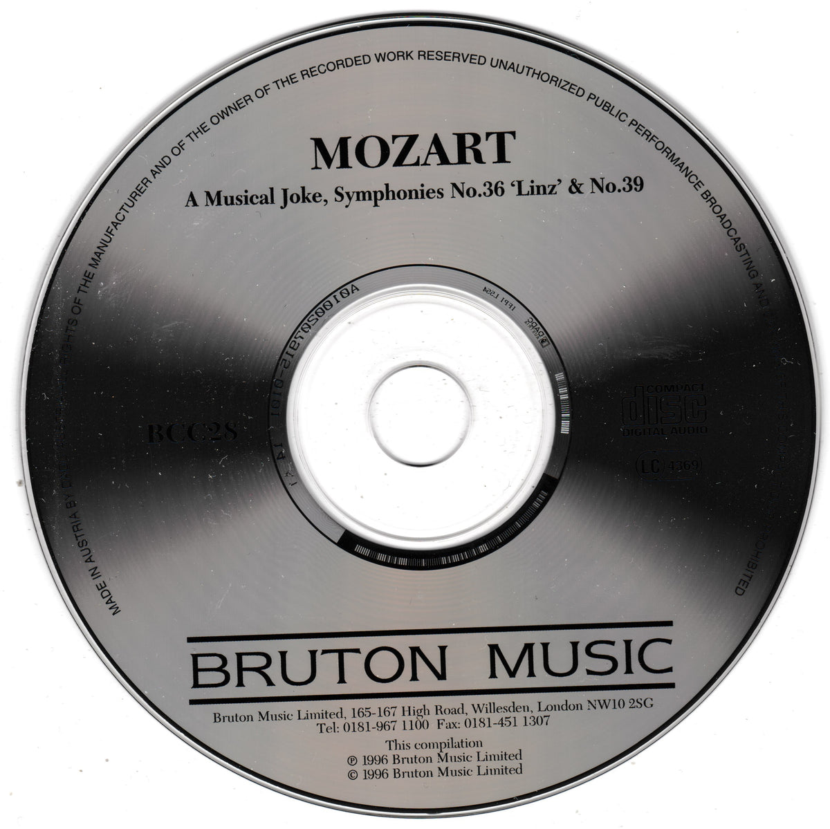 A single compact disc with printed text reading MOZART and BRUTON MUSIC, photographed on a plain white background.