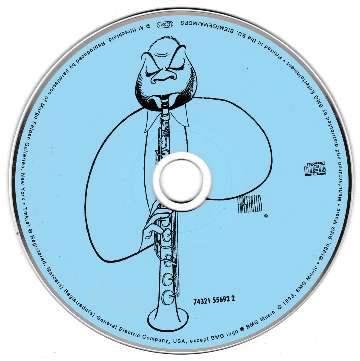 A circular blue compact disc with a silver reflective rim, featuring a black line-art illustration of a cartoon figure holding a flute. The center hub is white, and small black text and logos are printed around the disc.