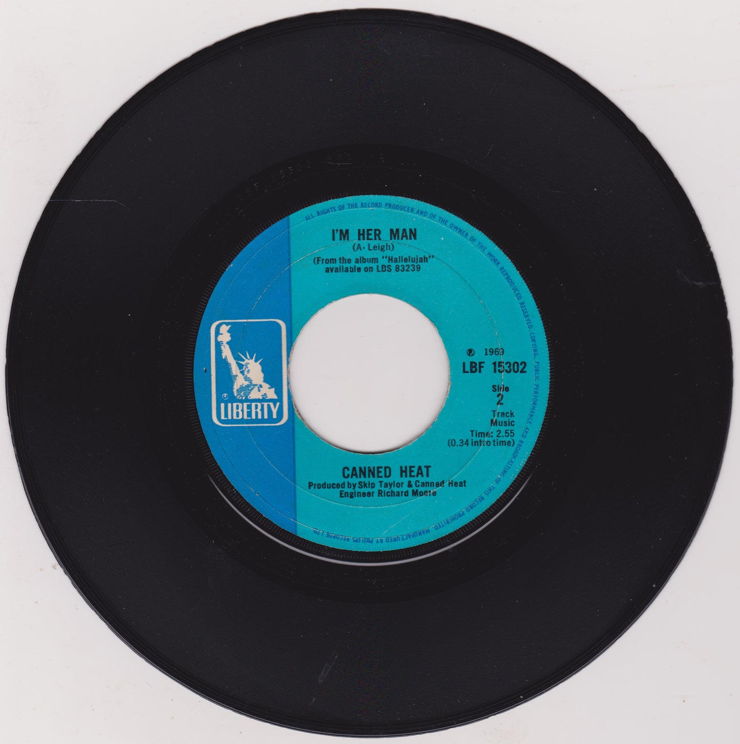 Vinyl record with a blue label on a white background