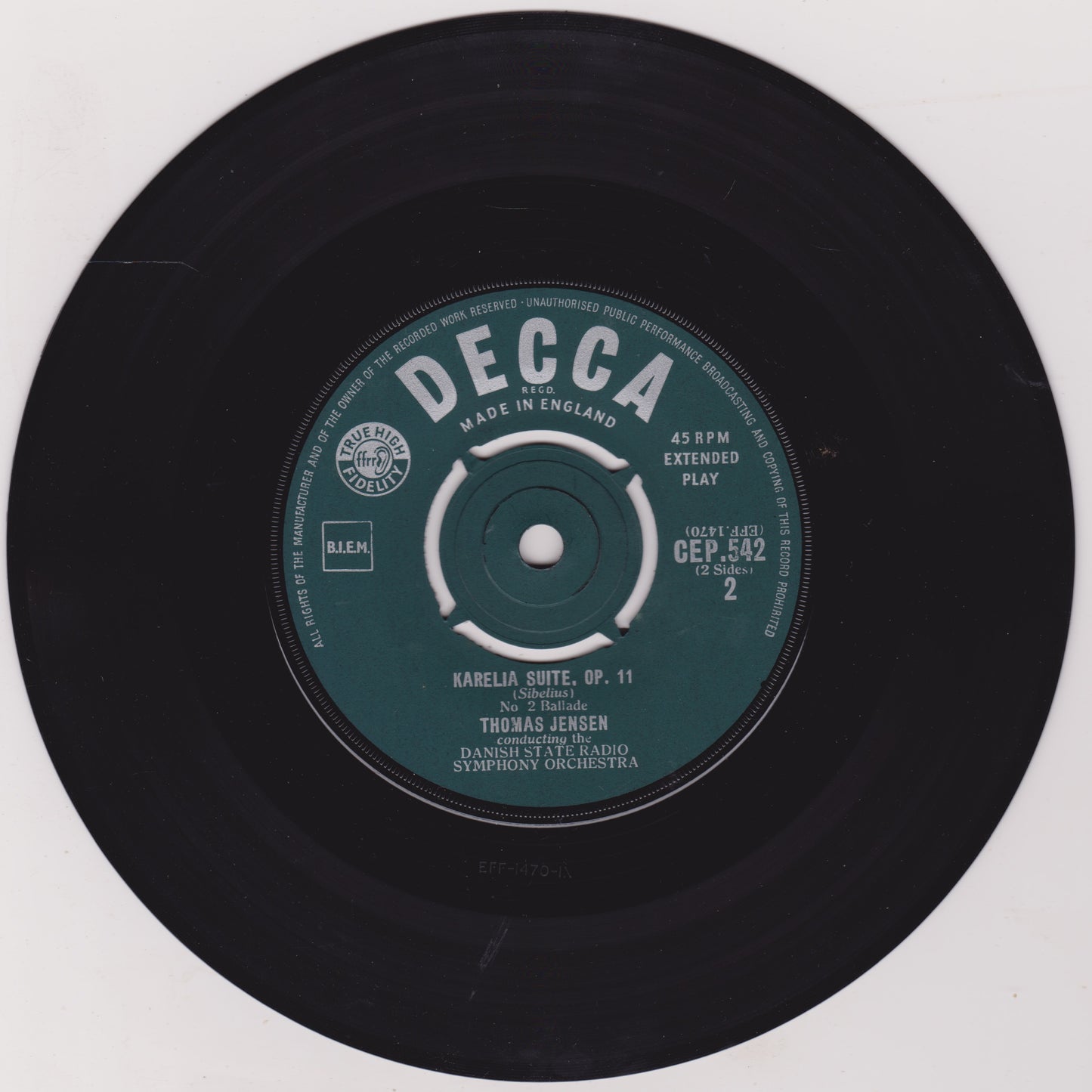 Black vinyl record with a Decca label on a white background