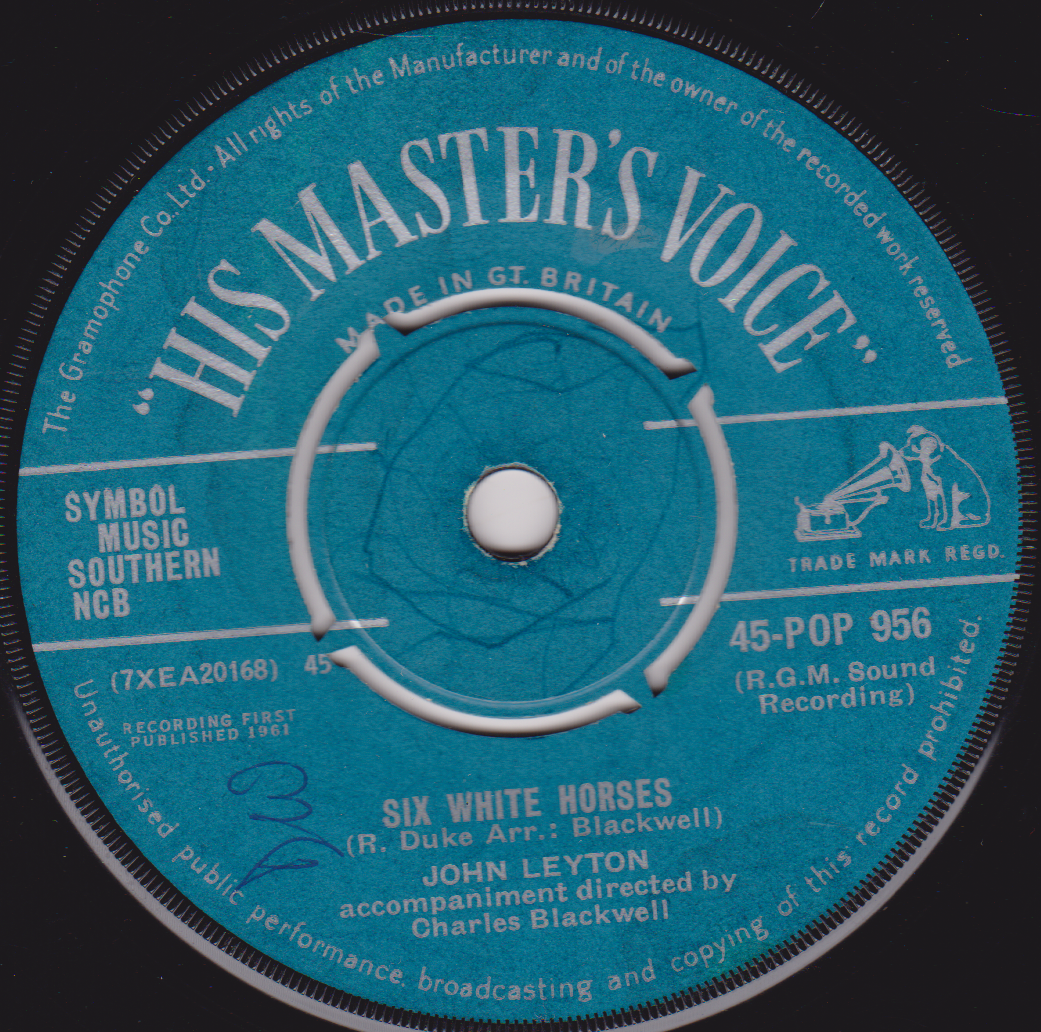 Blue label of 'His Master's Voice' with text and branding