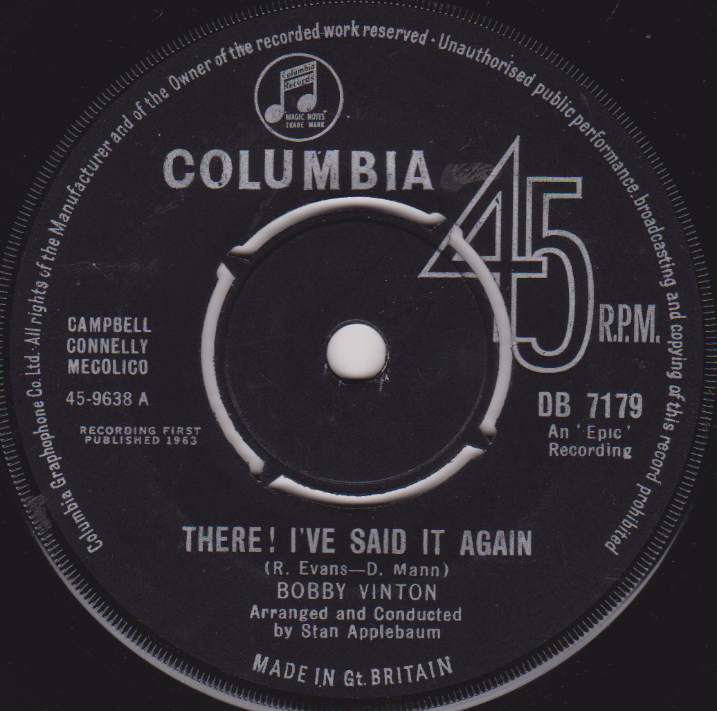 Record label from a Columbia 45 RPM record with text and branding.