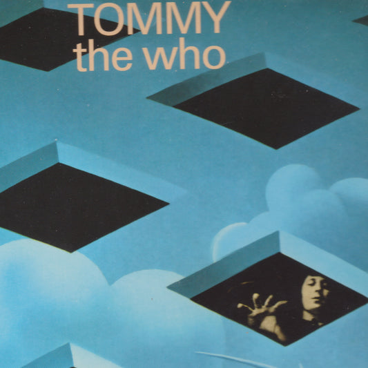 Album cover for 'Tommy' by The Who with geometric shapes and a silhouette of a person.
